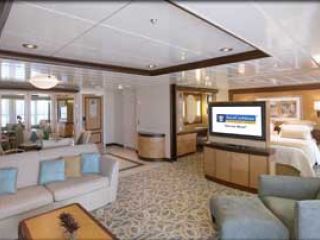 Описание на каюта Голям апартамент - категория OS на круизен кораб FREEDOM of the Seas – обзавеждане, площ, разположение